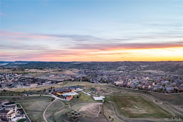 aerial view of property's location with nearby suburban area