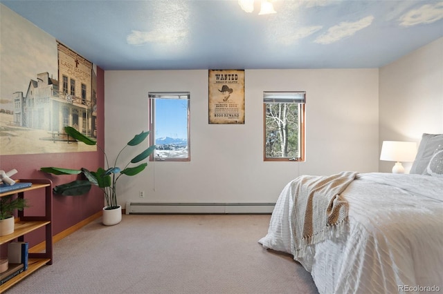 bedroom featuring carpet and a baseboard radiator