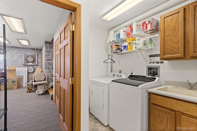 washroom featuring light colored carpet, cabinets, separate washer and dryer, and sink