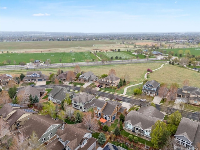 drone / aerial view with a rural view and a residential view