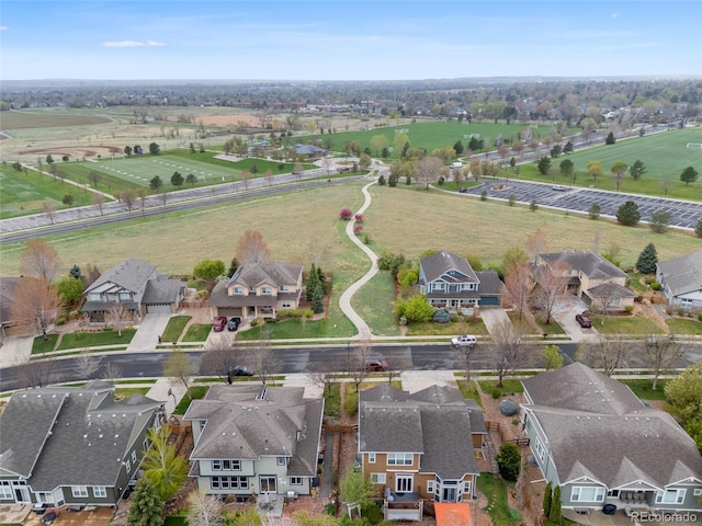 aerial view featuring a rural view and a residential view