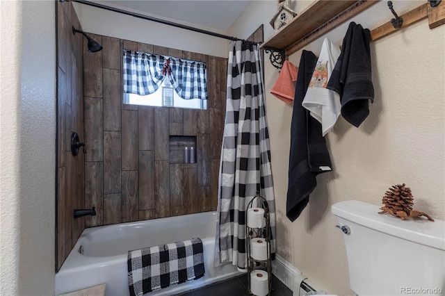 10640 W 46th Ave, Wheat Ridge, CO 80033 - bathroom with shower / bath combo, toilet, and a textured wall