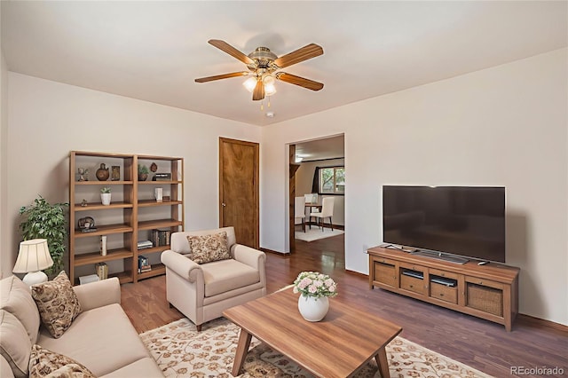8333 Mummy Range Dr, Fort Collins, CO 80528 - living room featuring a ceiling fan and wood finished floors
