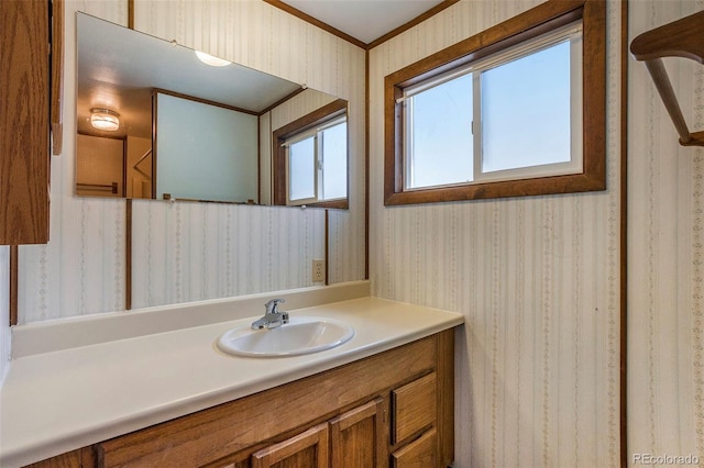 8333 Mummy Range Dr, Fort Collins, CO 80528 - bathroom with wallpapered walls, vanity, and crown molding
