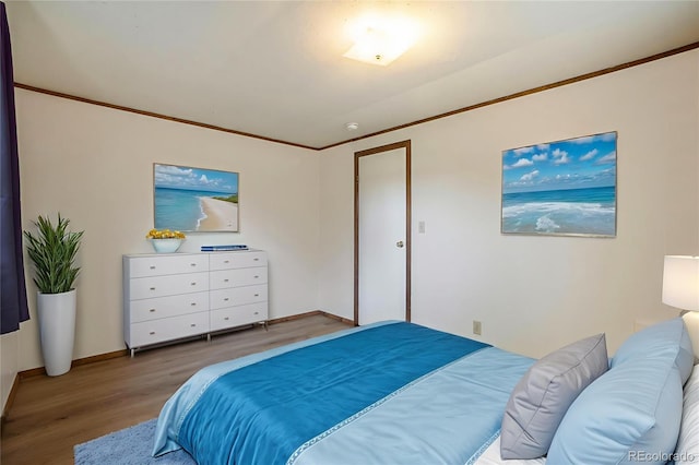 8333 Mummy Range Dr, Fort Collins, CO 80528 - bedroom with wood finished floors and crown molding