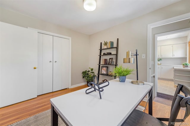 office space with light wood-style floors