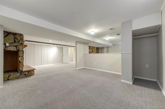finished below grade area featuring carpet floors and baseboards