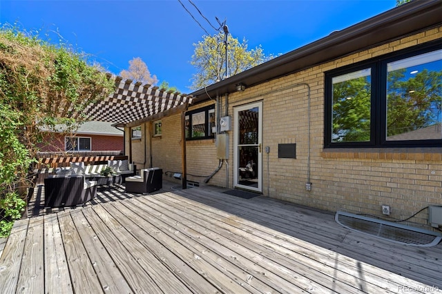 wooden deck featuring an outdoor living space