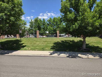 12742 Clermont St, Thornton, CO 80241 - view of home's community featuring a yard
