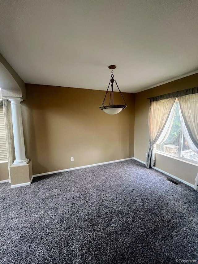12742 Clermont St, Thornton, CO 80241 - unfurnished room with decorative columns, carpet flooring, and baseboards