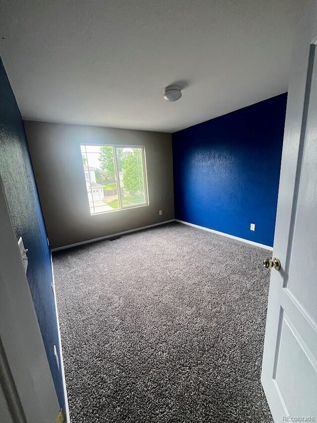 12742 Clermont St, Thornton, CO 80241 - empty room with carpet flooring and baseboards
