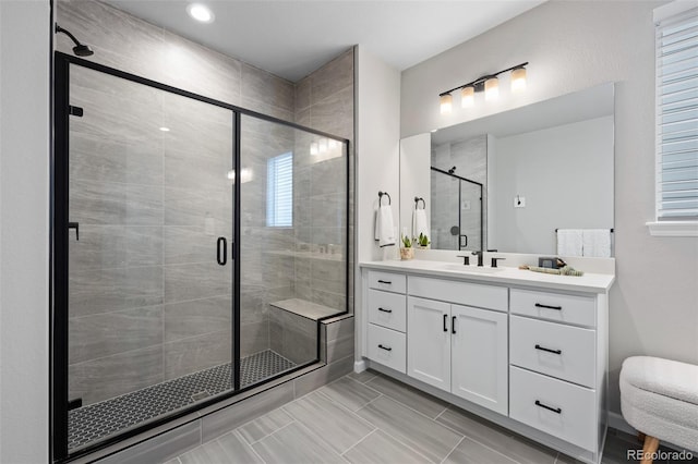 bathroom featuring vanity and walk in shower