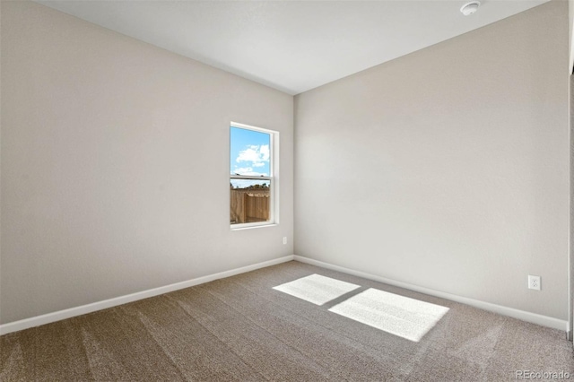 7326 Green River Ave, Frederick, CO 80530 - unfurnished room featuring carpet, baseboards, and a smoke detector