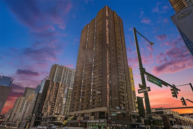 view of outdoor building at dusk