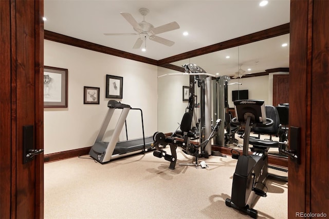 workout area with light colored carpet, ceiling fan, and ornamental molding