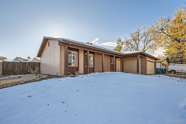 single story home with a garage