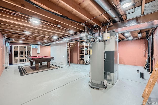 basement with water heater and billiards