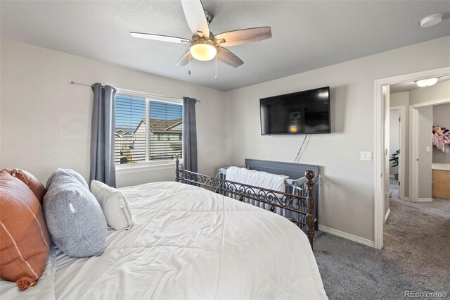 carpeted bedroom featuring ceiling fan