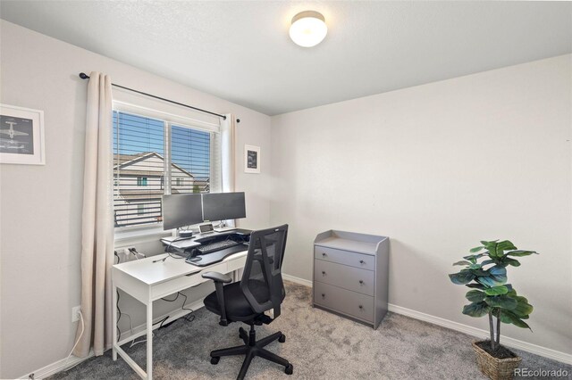 view of carpeted home office