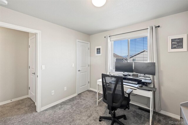 home office with light colored carpet