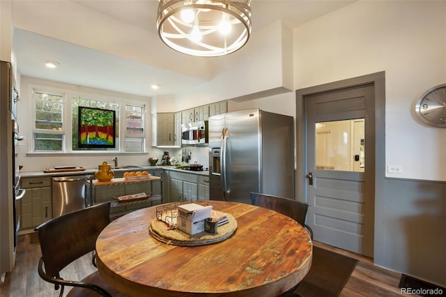 dining space with dark wood-type flooring