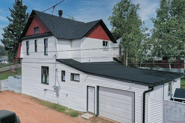 exterior space with a garage