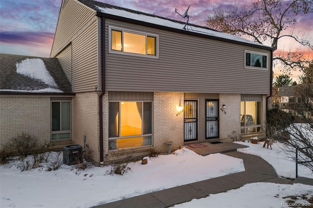 view of front of property featuring central AC unit