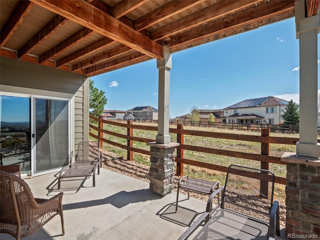 view of patio / terrace with a residential view