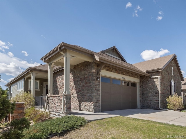 view of home's exterior featuring a garage, concrete driveway, stone siding, and a shingled roof