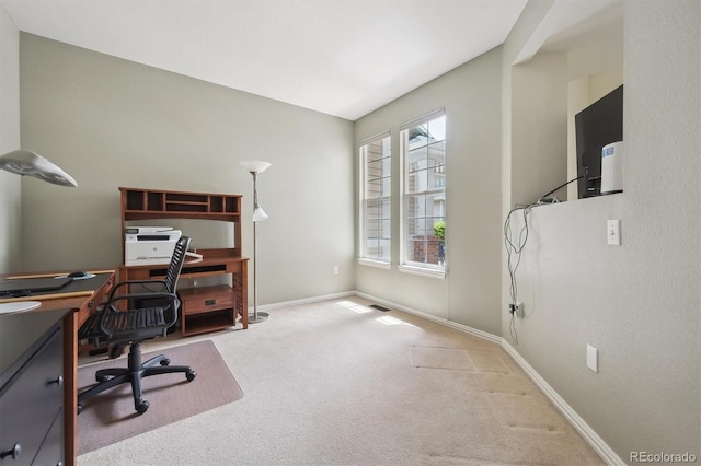 office with baseboards and carpet flooring