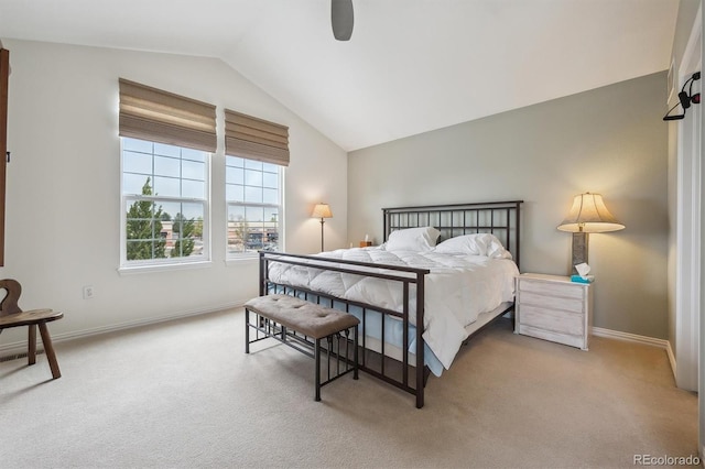carpeted bedroom featuring baseboards, a ceiling fan, and lofted ceiling