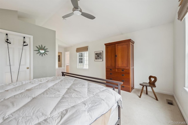 bedroom with ceiling fan, visible vents, baseboards, lofted ceiling, and light carpet