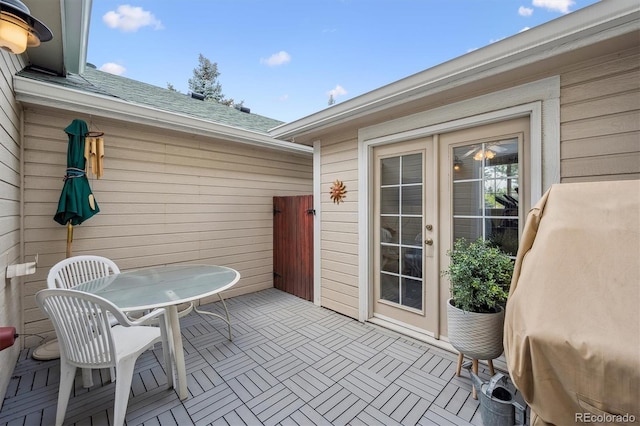 view of patio / terrace featuring outdoor dining space and a grill