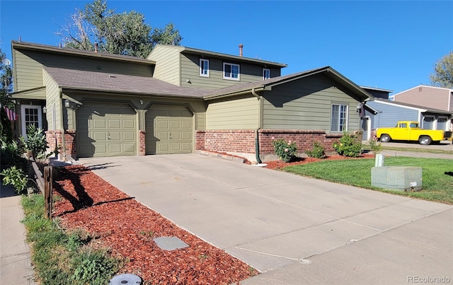 view of front of property with a garage