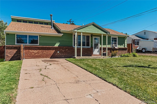 view of front of house featuring a front yard and a porch