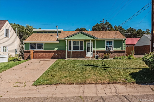 view of front of home featuring a front yard