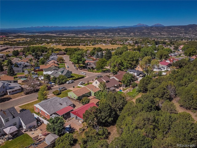 drone / aerial view featuring a mountain view