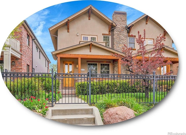 view of front of house featuring a fenced front yard, stucco siding, a gate, a chimney, and covered porch