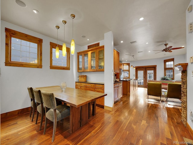 dining area featuring recessed lighting, baseboards, visible vents, and hardwood / wood-style floors