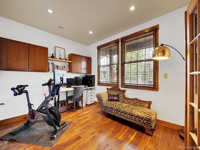 office with recessed lighting, baseboards, and light wood-type flooring