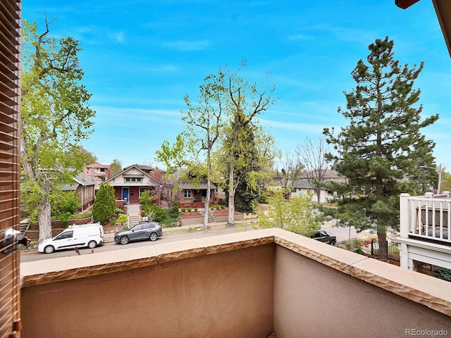 balcony featuring a residential view