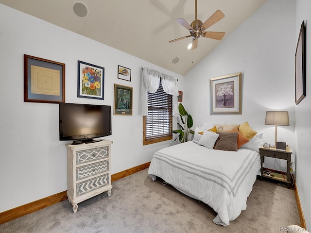 carpeted bedroom featuring baseboards, ceiling fan, and high vaulted ceiling