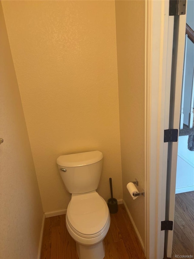 6240 Everett Ct Unit D, Arvada, CO 80004 - bathroom with wood finished floors and toilet