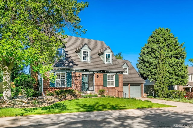 7193 S Newport Way, Centennial, CO 80112 - new england style home with brick siding, concrete driveway, a garage, and a front lawn