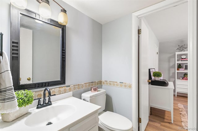 7193 S Newport Way, Centennial, CO 80112 - bathroom with wood finished floors and vanity