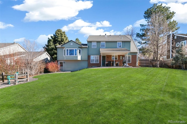 7193 S Newport Way, Centennial, CO 80112 - rear view of property with brick siding