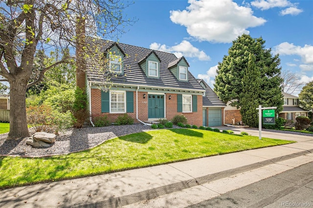 7193 S Newport Way, Centennial, CO 80112 - cape cod house featuring brick siding, driveway, a front yard, and a chimney