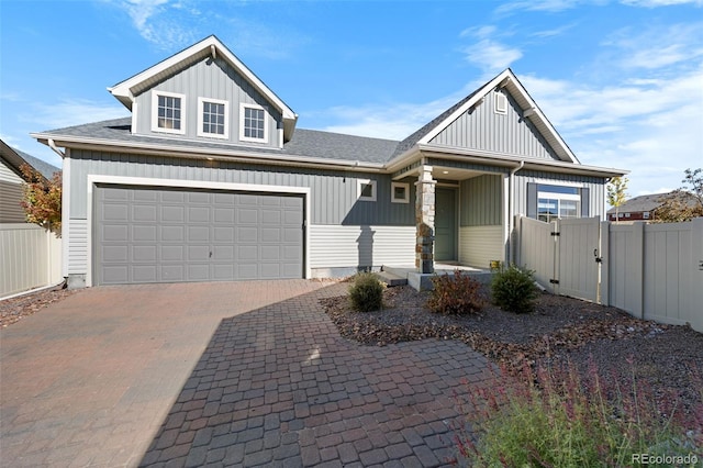 view of front of property with a garage