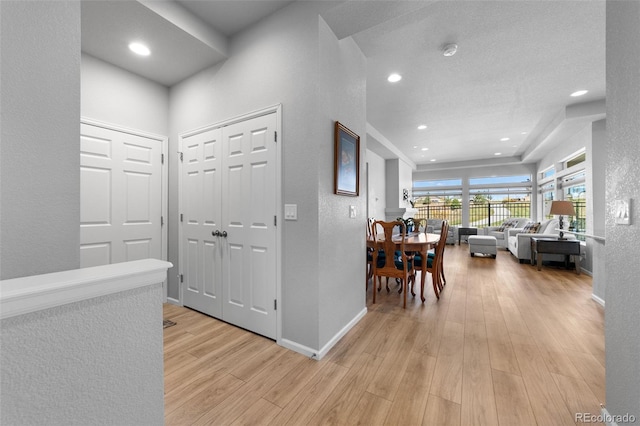 hallway featuring light wood-type flooring