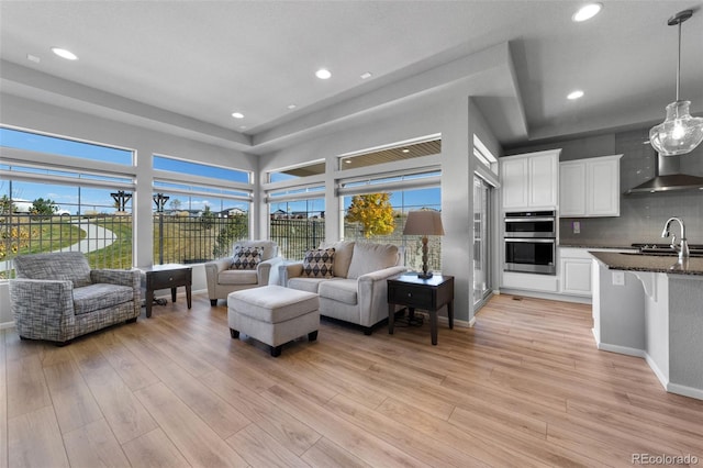 living room with light hardwood / wood-style floors